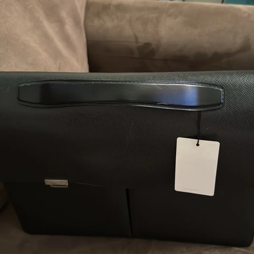 -* Louis Vuitton Black Taiga Khazan Black
